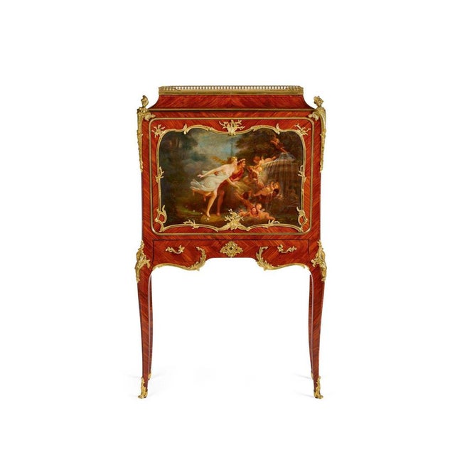 PAUL SORMANI (1817-1877). A magnificent secretary made of royal wood veneer, on curved legs, richly decorated with a large...