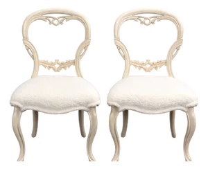 Pair of French-Style Dining Chairs With Carved Backs and White Bouclé Upholstery