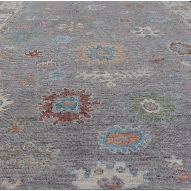 Traditional Hand Knotted Floral Oushak With a Gray Background and Multi-Colors For Sale - Image 3 of 13