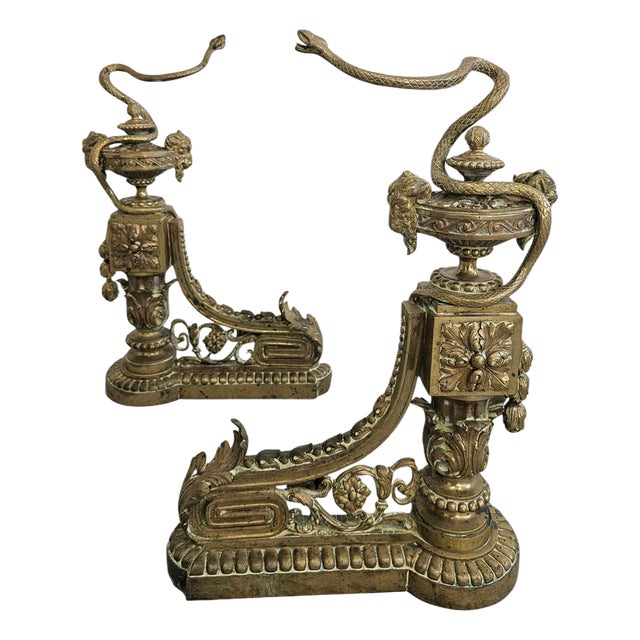French Empire Andirons in Gilt Brass Featuring Snakes and Ram Head, Set of 2 For Sale
