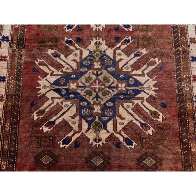 This beautiful Transcaucasian rug represents traditional craftsmanship with rich geometric patterns and rich colors. The...