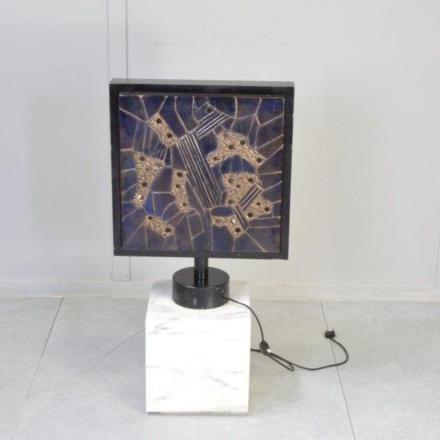 The 1970s in Italy produced a parallel track of decorative lighting that ran alongside the canonical names: a dense...