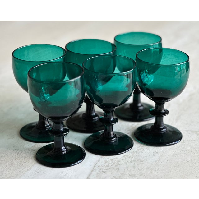 Stunning Emerald/Greenish Blue antique set of 6 cordial glasses. Handblown, they feature a bladed knop and only one has a...