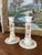 This pair of vintage ceramic candlesticks by Gien France features hand-painted floral motifs in rich tones of green, pink,...