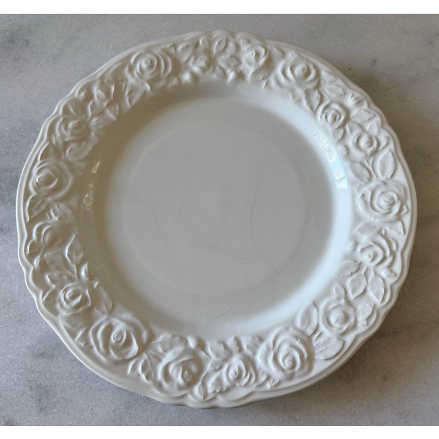 Set of 4 vintage glazed white dinner plates by "Franco Giorgi by Quadrifoglio." Plates are 10.25" in diameter and hand-...