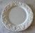 Set of 4 vintage glazed white dinner plates by "Franco Giorgi by Quadrifoglio." Plates are 10.25" in diameter and hand-...