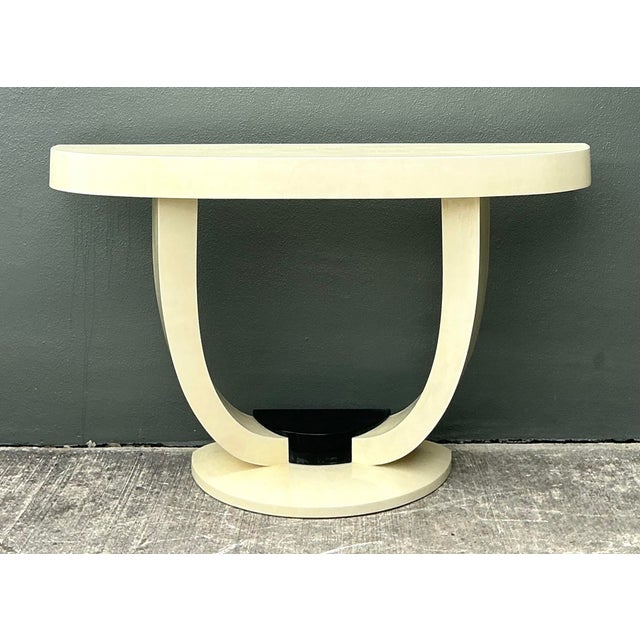 This stunning Postmodern console table is a masterful homage to the legendary designs of Karl Springer. Featuring a...