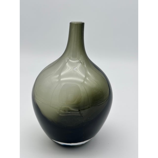 Mid-Century Holmgaard blown glass vase in hues of smoked green/black. Vase is in excellent condition, no chips or cracks....