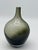 Mid-Century Holmgaard blown glass vase in hues of smoked green/black. Vase is in excellent condition, no chips or cracks....