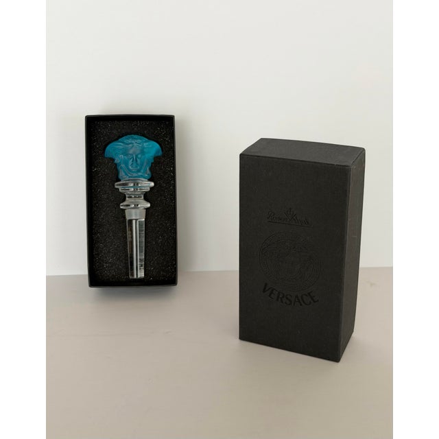 We are very pleased to offer this striking vintage Medusa bottle stopper by Versace for Rosenthal, circa 1990s. Crafted in...