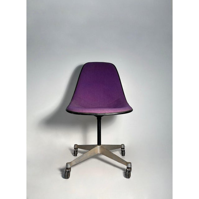 Charles Eames Herman Miller Pivot Side Chair on Castors (PSCC) in a scarce Purple Fabric Upholstery is not tight against...