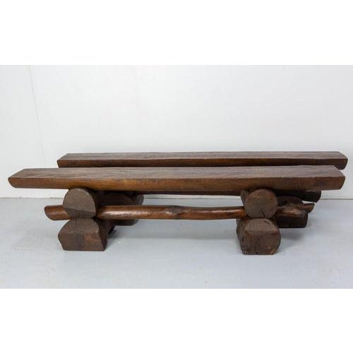 French pair of benches made circa 1960. Brutalist style made with trunks and half trunks. Small traces of blue paint,...
