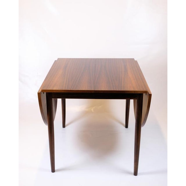 Arne vodder dining table in rosewood from the 1960s. With flaps and 2 extension leaves of 47 cm. Classic danish design in...
