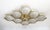 Italian midcentury flush mount with eight glossy gray Murano glass shades mounted on solid brass frame in satin brass...