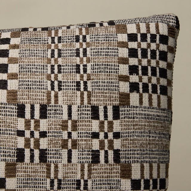 This pillow features Brimfield with a knife edge finish. Inspired by a vintage textile we found at the famed Brimfield...