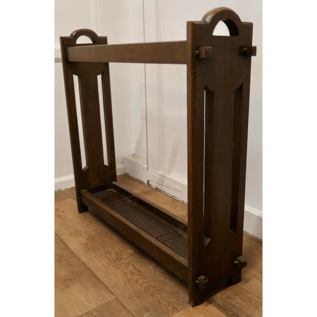An Arts and Crafts Oak Hall Stick or Umbrella Stand, This very sturdy stand is made in Solid Oak the top is divided into 3...