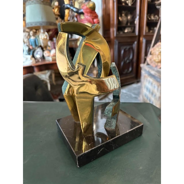 This stunning vintage sculpture, created in the 1990s, is a beautiful example of abstract expression. The piece is crafted...