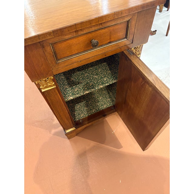 Early 20th Century Italian Walnut Cabinet with 1 drawer and a 2 shelf Cabinet below with gilt wood highlights. Original...