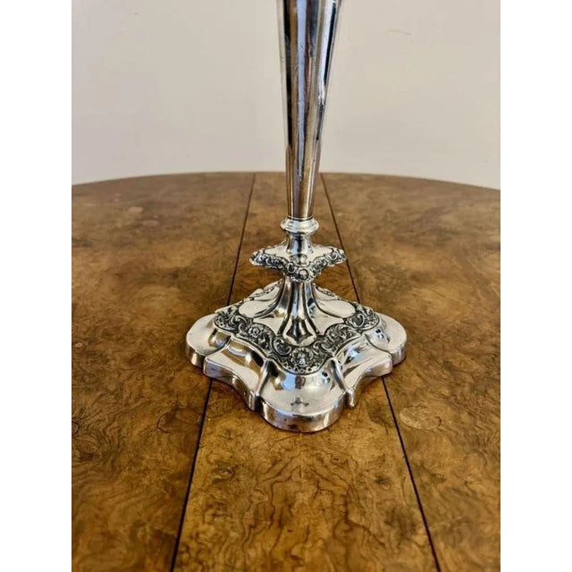 Outstanding quality antique Victorian ornate silver plated candelabra and candlestick set having a fine quality antique...