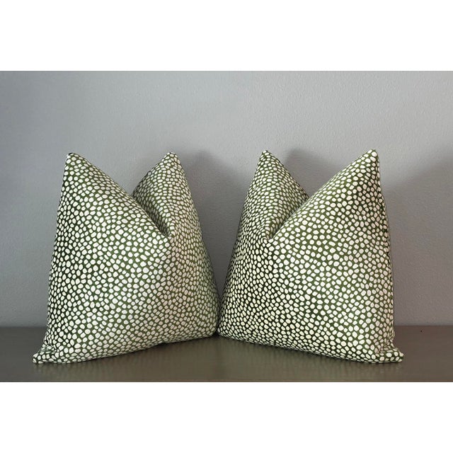 Elevate your interior decor with the timeless sophistication of Pindler & Pindler luxury throw pillows, beautifully...