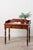 This 19th-century two-drawer mahogany desk/wash stand features a gallery back with curved edges that frame the back and...