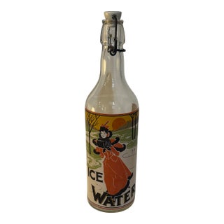 Vintage Art Nouveau “Ice Water” Swing Top Glass Bottle Featuring Victorian Lady Skating For Sale