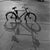 The photographer's note regarding this work is "A bicycle with its shadow in the autumn sun, Germany 1930s." This work...