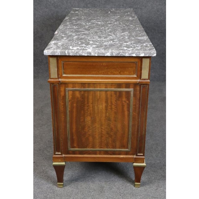 Make a statement with this exquisite Faded Ribbon Mahogany Sideboard, crowned with a luxurious Grey Griotte marble top and...