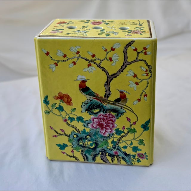 This Chinese export Famille Rose rectangular porcelain vase, pen holder, or brush pot, features intricate hand painted...