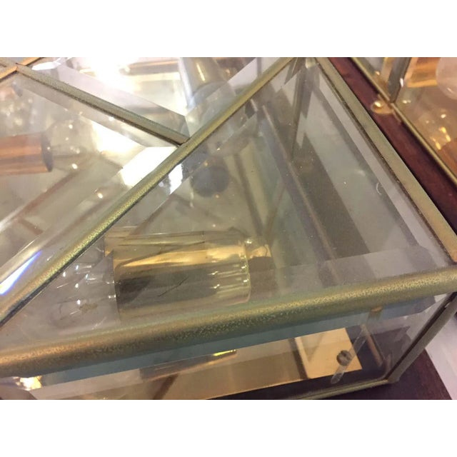 - Pair of 70s wall lights - Metal and brass structure - Cut crystals - Wooden support - 4 lights European Plug (up to...