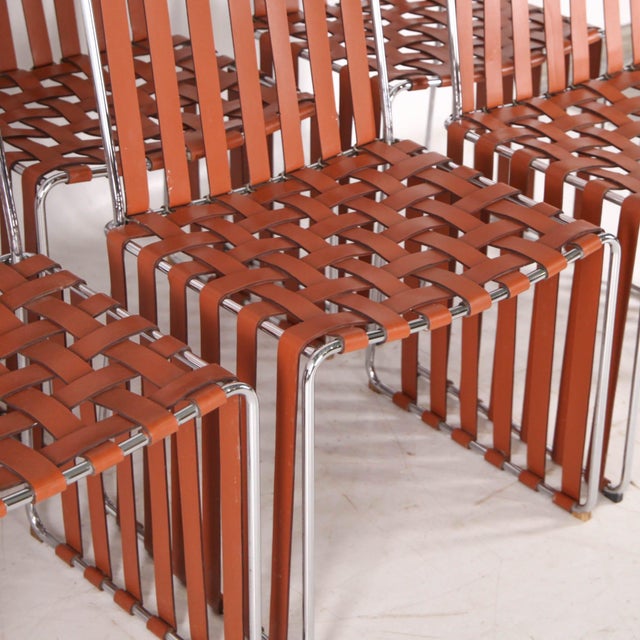 Rare set of six FRAG brand chairs (see label), made in Italy. Superb design combining a chrome frame and brown leather...