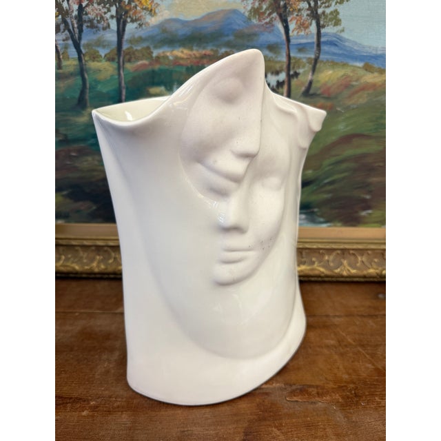 Featuring a unique sculptural design with flowing facial details, this piece blends modern, abstract, and contemporary art...