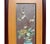 This is a ceramic piece with dimensional theme of oriental flowers and vases. This plaque is installed with wooden frame...