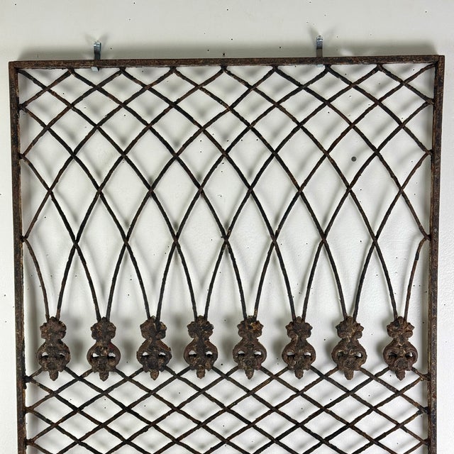 A NYC architectural salvage metal window grate, circa Art Deco period. It's painted white on one side, with the other...