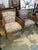 Fantastic pair of regency style cane side lounge chairs. Newly reupholstered. Excellent ready to use condition