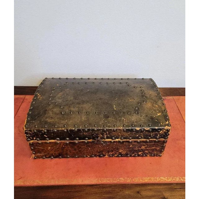 A scarce Continental heavily distressed leather flatware storage box chest, 20th century, finely hand-crafted, rectangular...