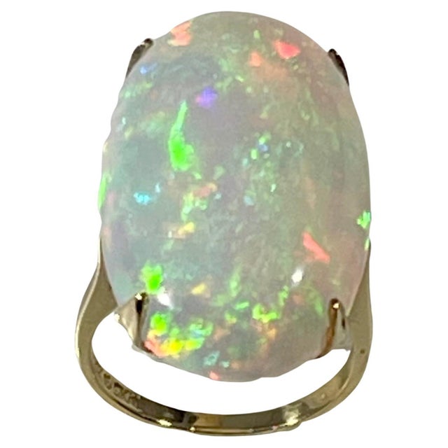 14 Carat Oval Shape Ethiopian Opal Cocktail Ring 14 Karat Yellow Gold For Sale - Image 15 of 18
