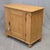 A charming and functional antique English pine single door cupboard with working key and original hardware. The cabinet...