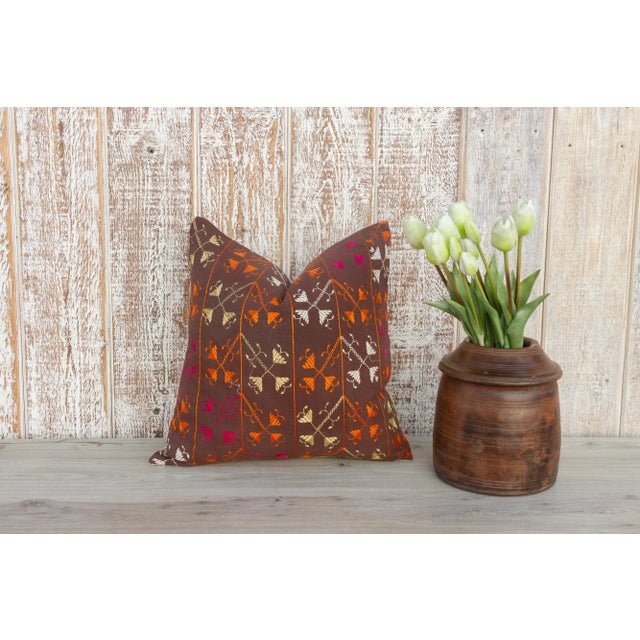 This colorful and luxurious Bagh Phulkari pillow features beautiful hand-done silk embroidery on top of a cotton fabric....