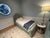 Elora Arched Upholstered Twin Bed with matching Twin Trundle in eucalyptus performance velvet. Excellent condition....