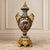 Make a striking statement with this ornate French-style decorative vase, featuring a rich navy blue and white porcelain...
