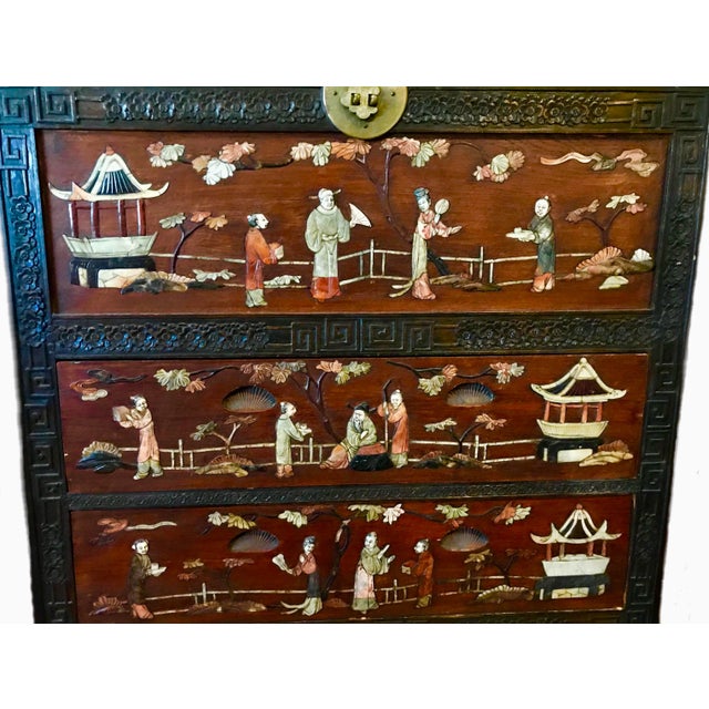 Antique Chinese inlaid stone, camphor wood, three drawer dresser. It’s easy to say that photos truly do not do justice to...