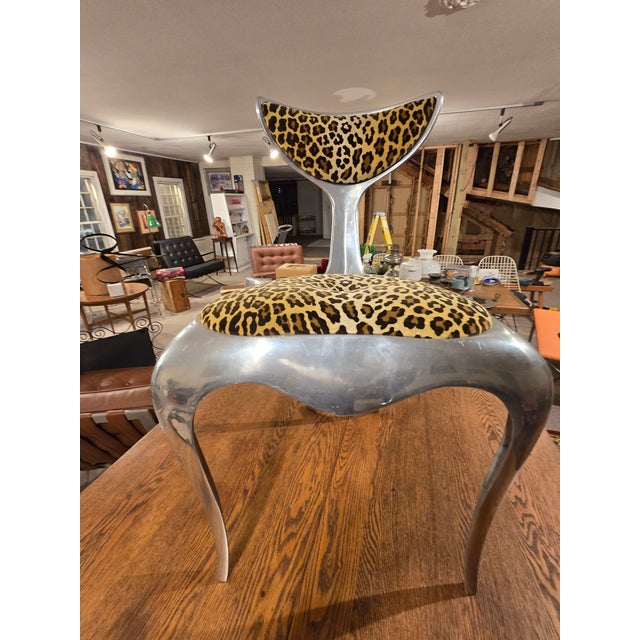 A confirmed limited-edition Mark Brazier-Jones "Dolphin Tail" chair, numbered #46 from an edition of 300, executed 1994,...