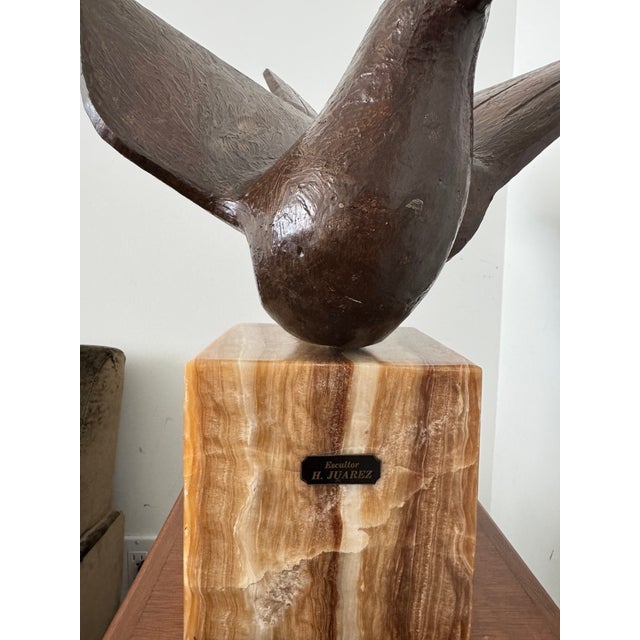 This modern bronze sculpture of a beautiful bird by Mexican artist Herbierto Juarez is a unique and striking piece of art....