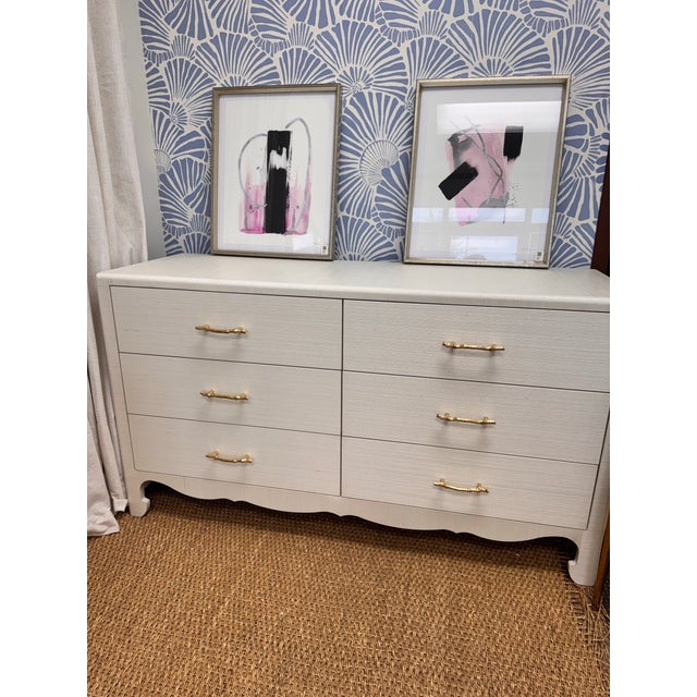 The Gianna Collection is meticulously wrapped in grasscloth and finished with a clear lacquer, highlighting the natural...