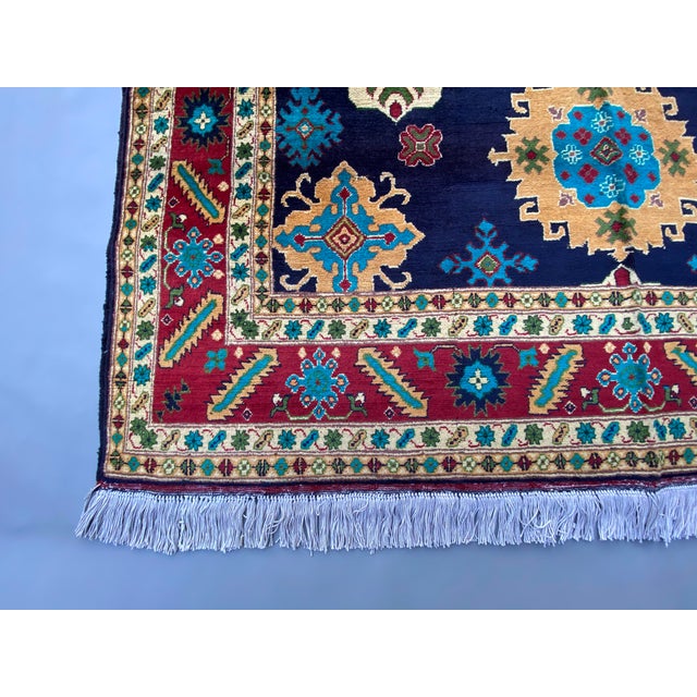 Islamic Handmade Afghan Bokhara Medallion Rug – Rich Red, Blue & Gold Tribal Design – 4'8" X 6'9" For Sale - Image 3 of 10