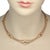This is an elegant collar necklace, it is crafted from 18k tri color gold andl featuring a triple row cable strand with...