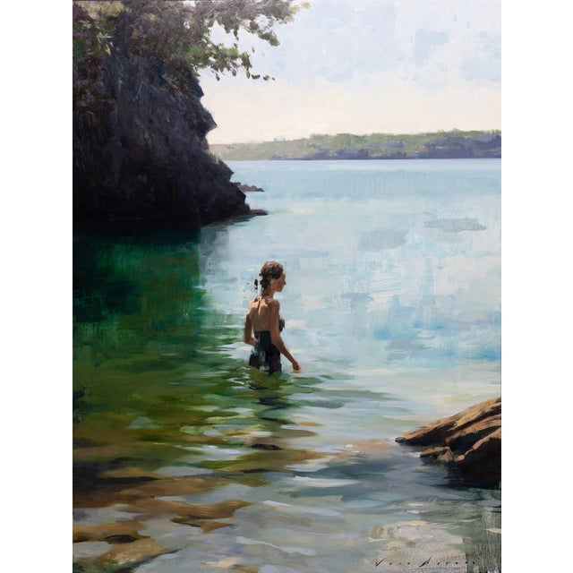 "Between Sea and Sky" is an oil on panel painting by Jon Doran, completed in 2026. In a sheltered cove, a woman in a dark...