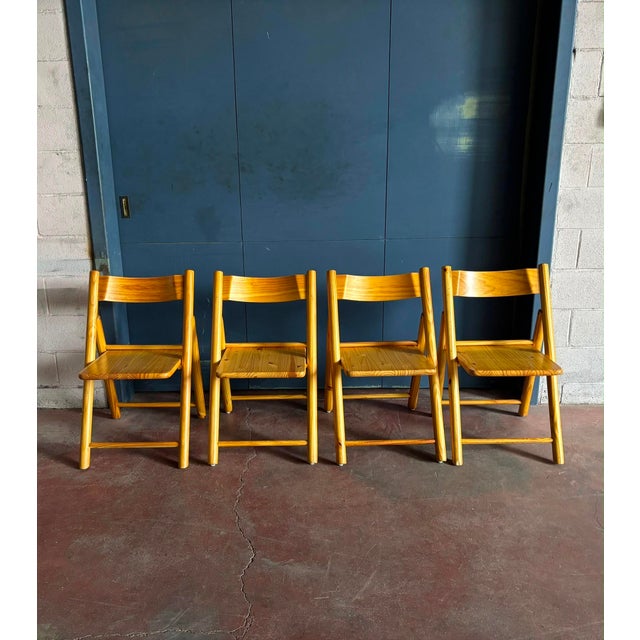Elegant Danish folding chairs in solid pine