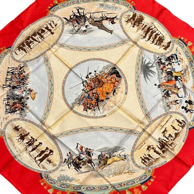 About This Piece: and rare, the Hermes "Africa Tribe" scarf is a vintage treasure. Woven from luxurious 90cm red silk, it...